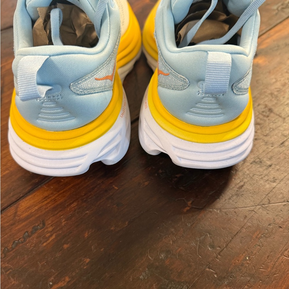 Hoka Blue and Yellow Athletic Shoes with Maximalist Cushioning - Picture 3 of 5